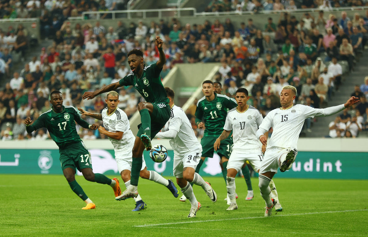 Costa Rica and Saudi Arabia players contesting the ball during an international football match. Photo: Reuters.