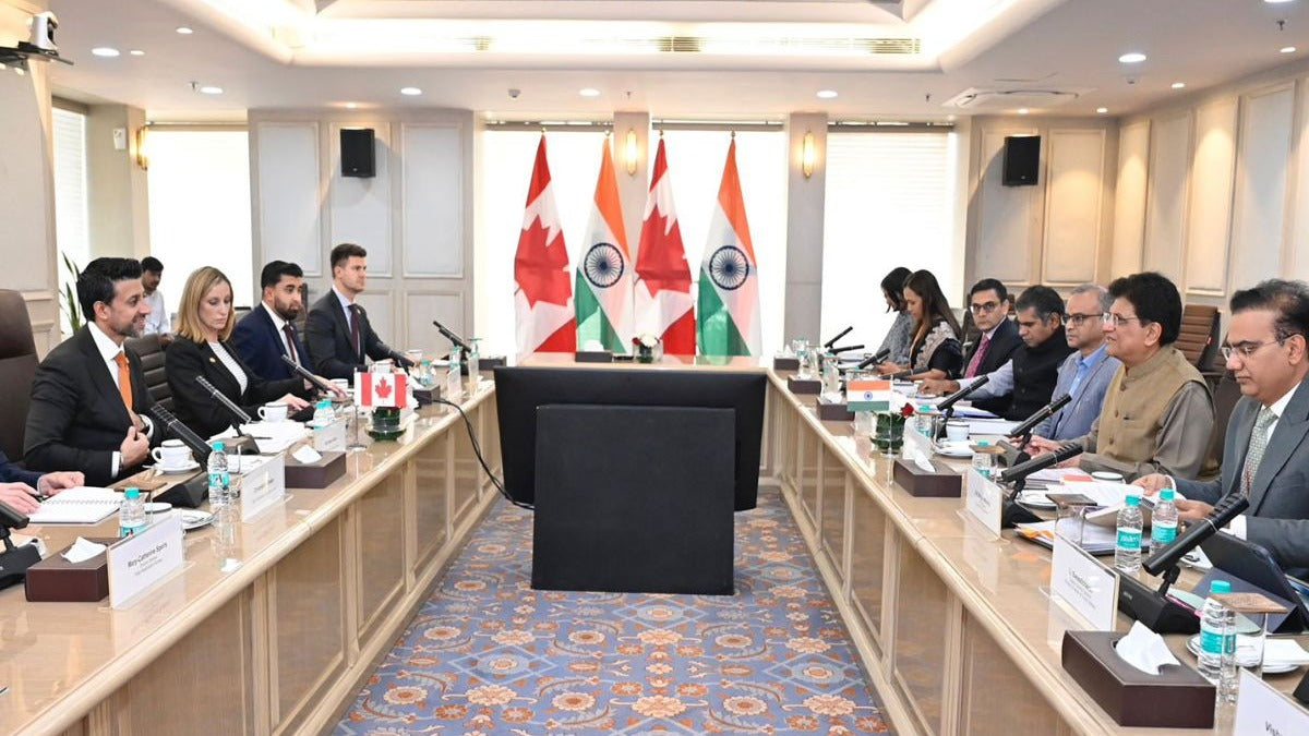 Canadian and Indian flags at a bilateral trade meeting. Photo: India Today.